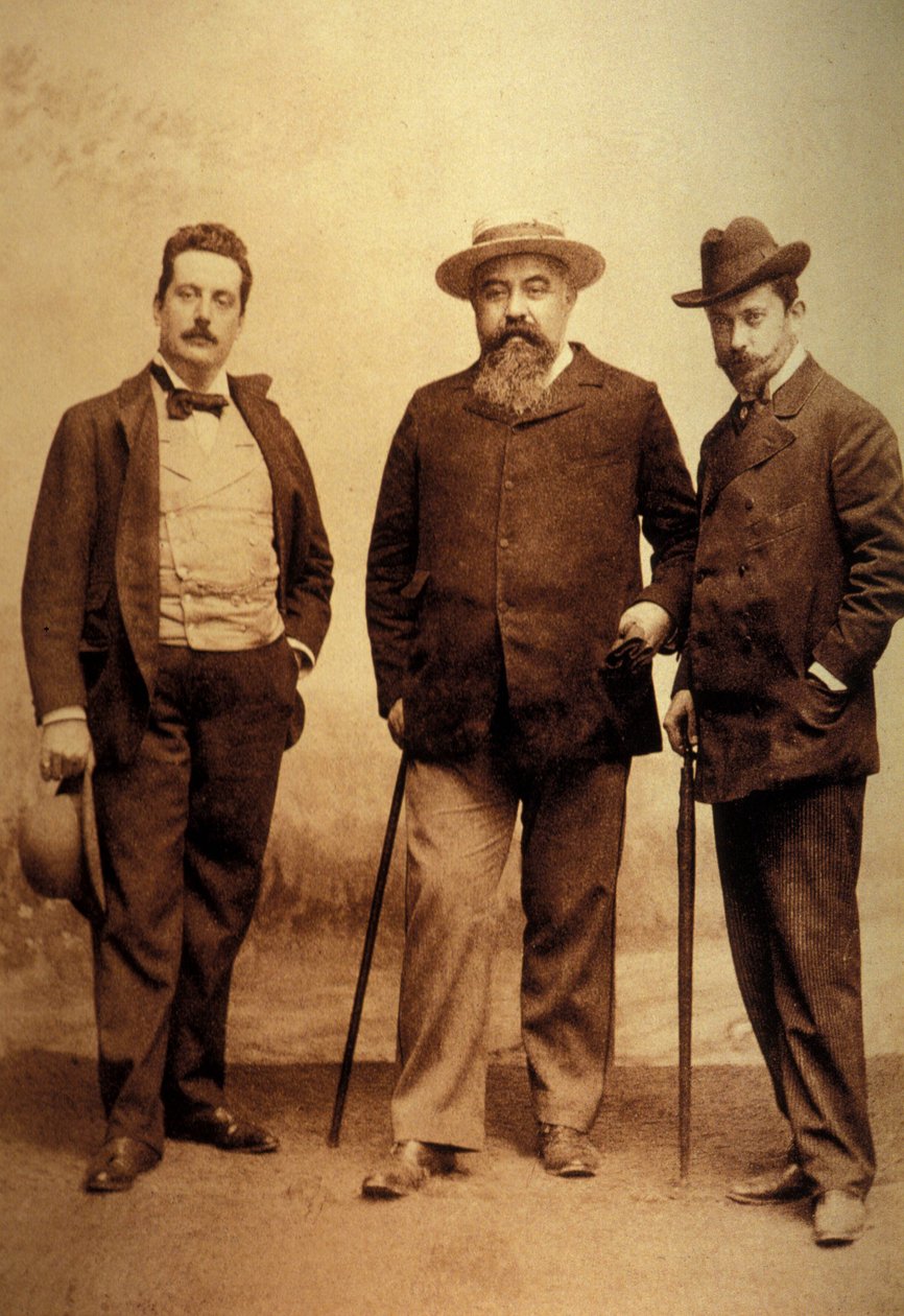 Giacomo Puccini (1858-1924) ze swoimi librettami, Giuseppe Giacosą i Luigim Ilicą. autorstwa Unknown