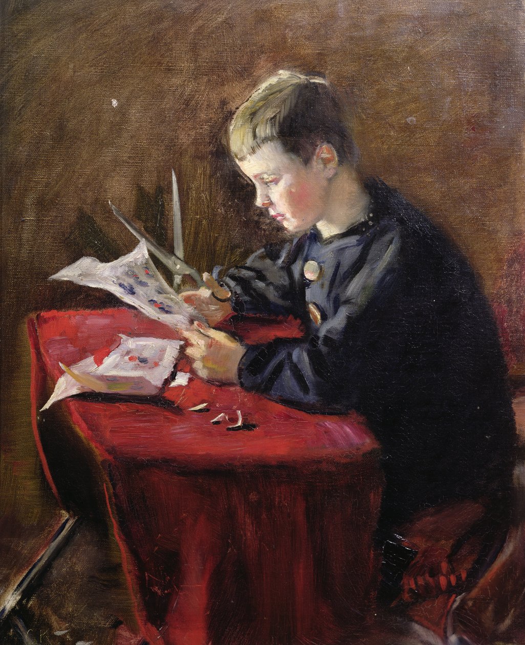 Chłopiec wycina ozdoby świąteczne autorstwa Christian Krohg