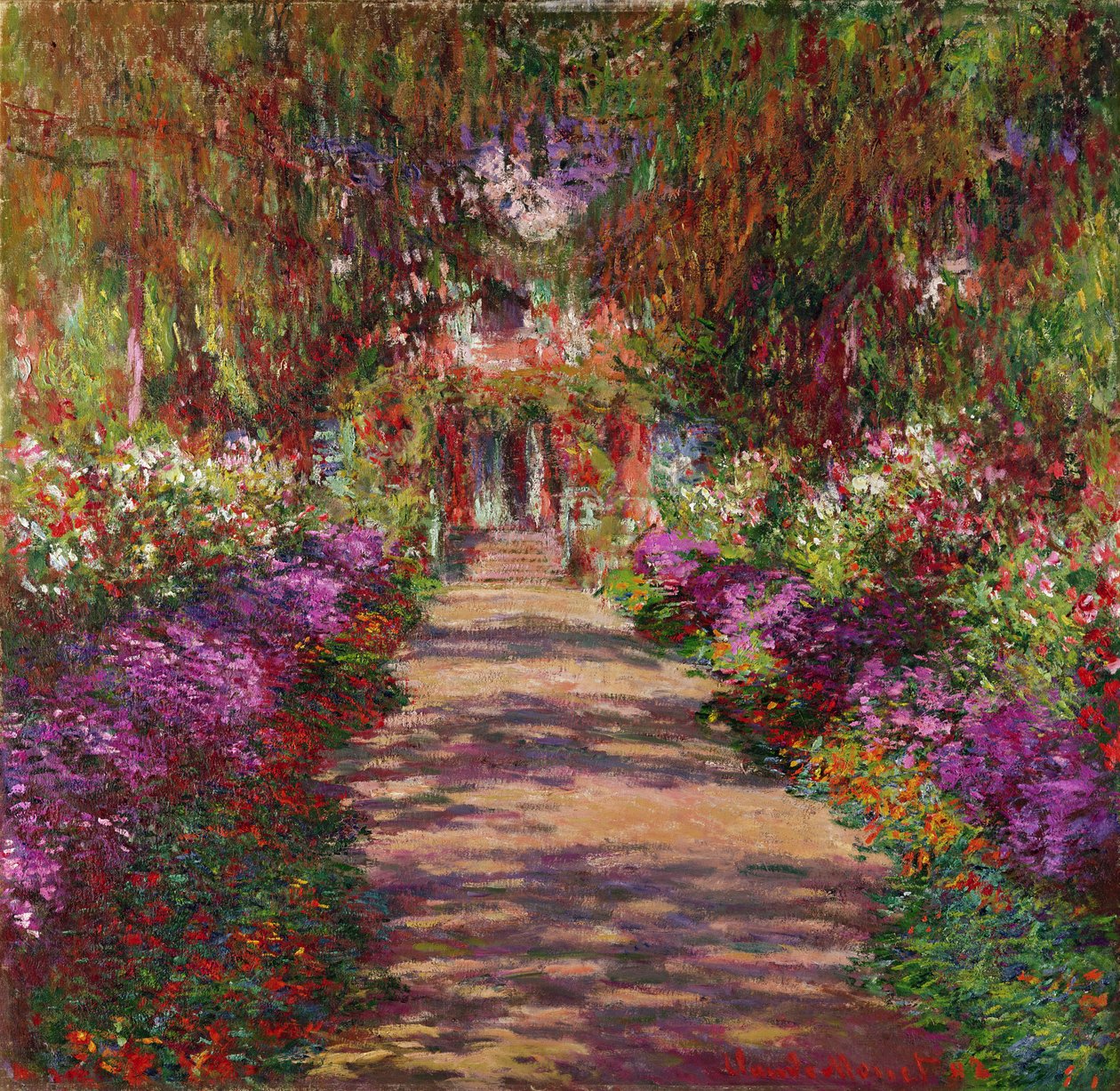 Ścieżka w ogrodzie Moneta, Giverny, 1902 autorstwa Claude Monet