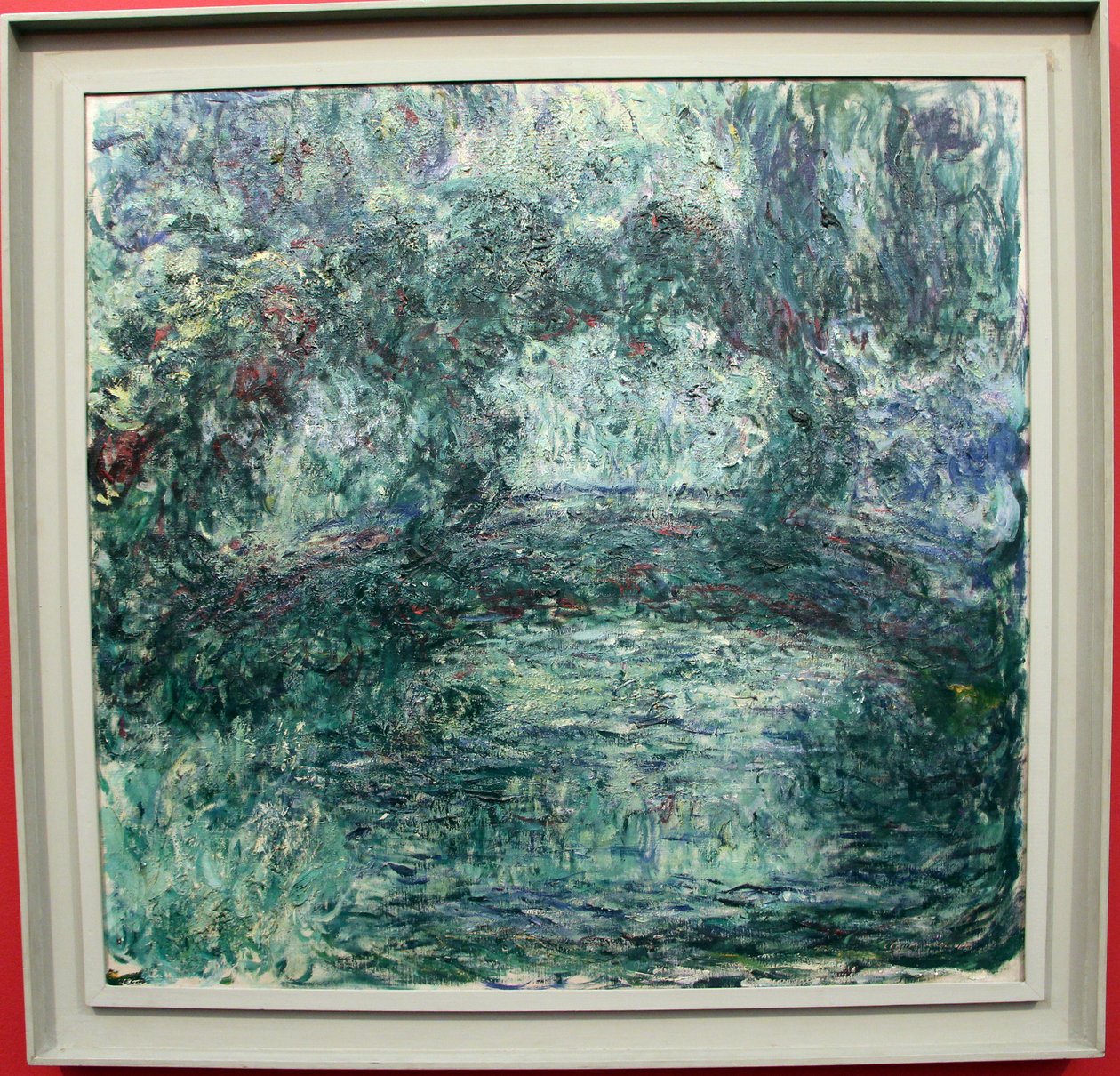 japoński most nad stawem z liliami wodnymi w Giverny autorstwa Claude Monet