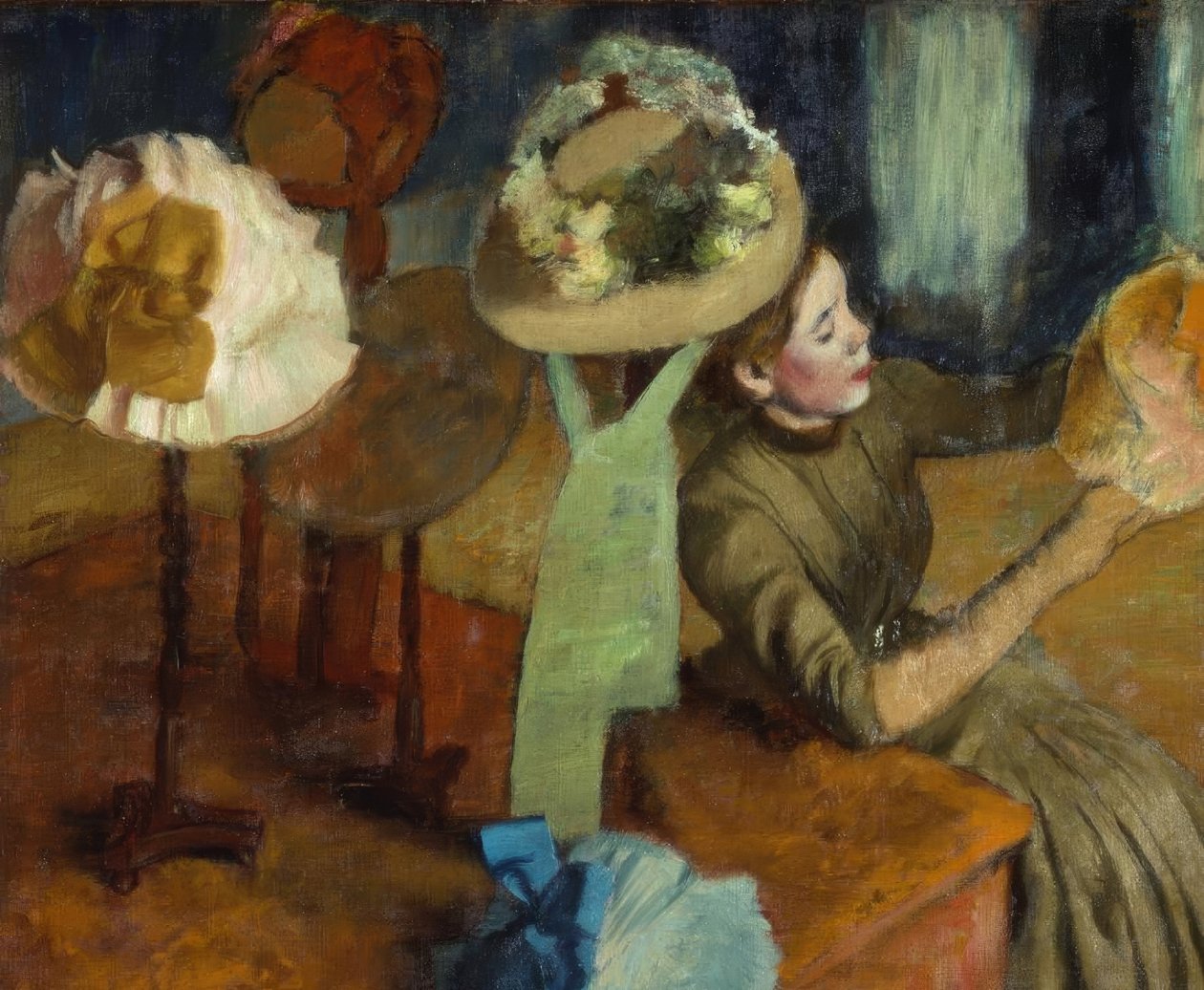 U producenta kapeluszy autorstwa Edgar Degas