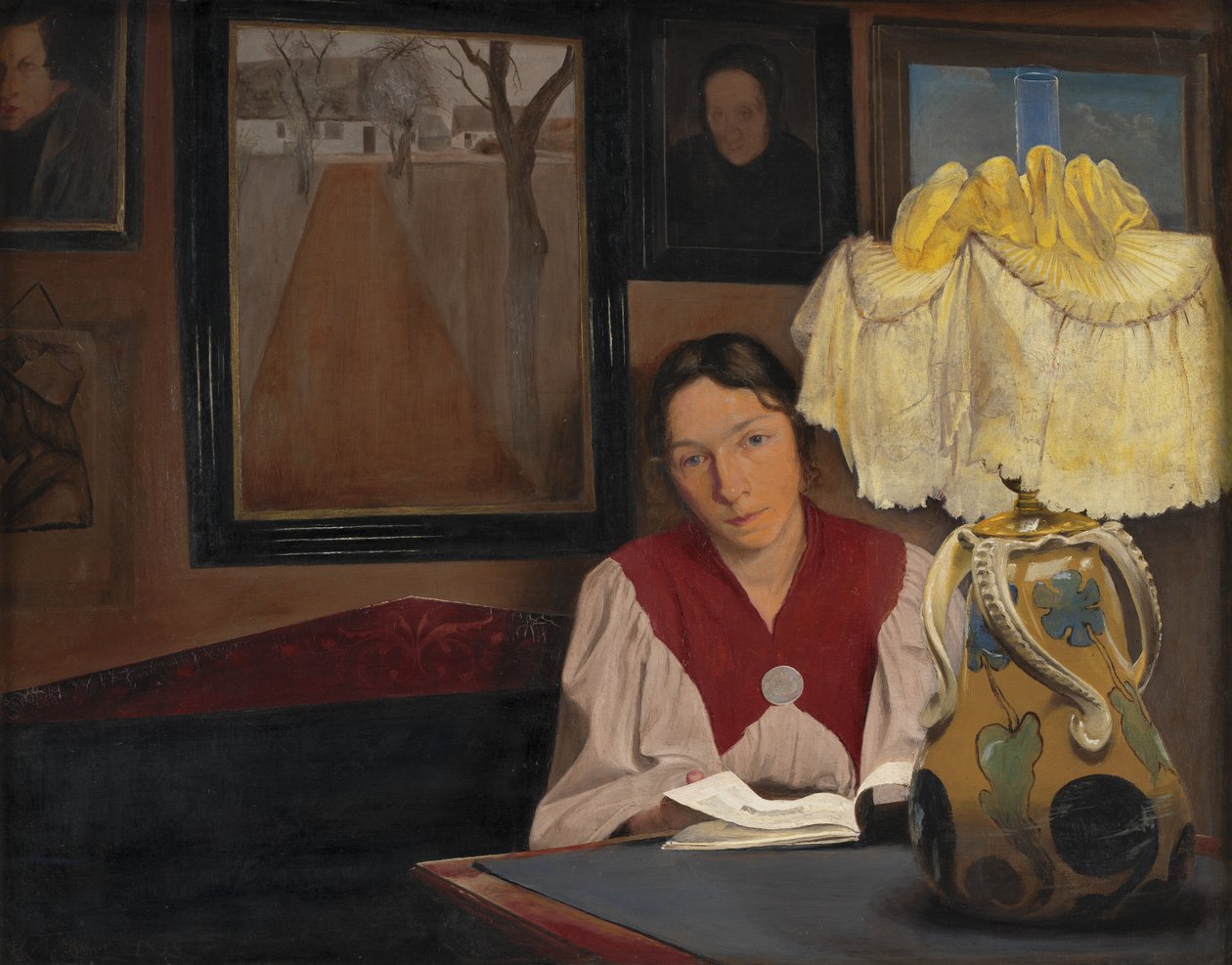 Żona artysty przy świetle lampy autorstwa Laurits Andersen Ring
