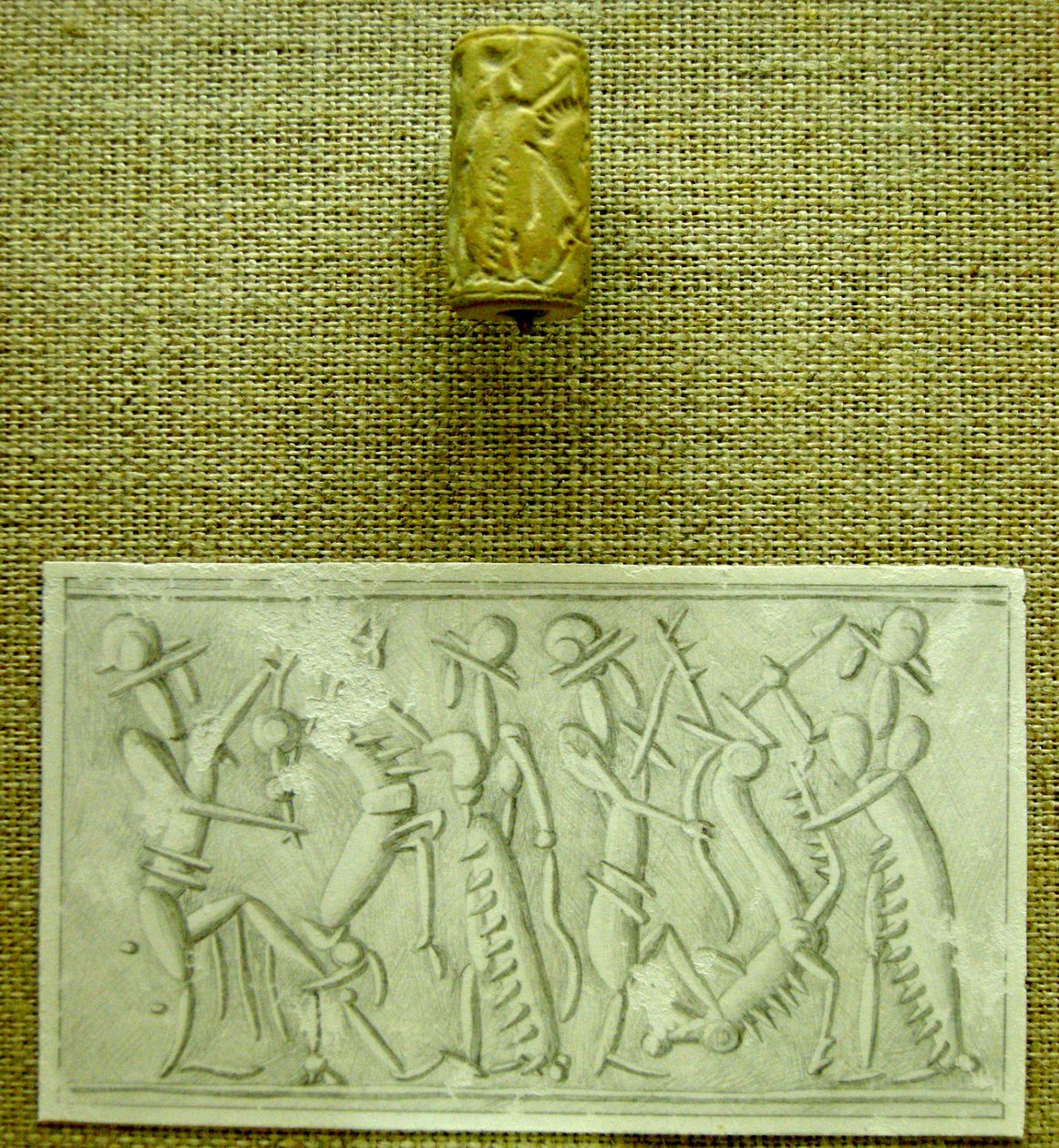 Uszczelka cylindryczna z wyciskiem (fajans) autorstwa Mesopotamian