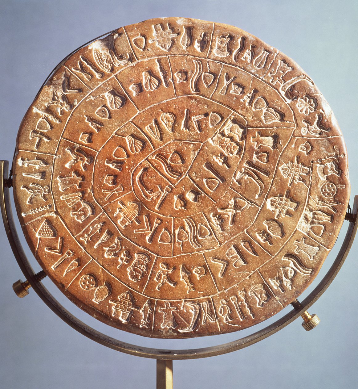 Dysk z Fajstos, z symbolami o nieznanym znaczeniu, z Krety, ok. 1650 pne (glina) (druga strona patrz 106116) autorstwa Minoan