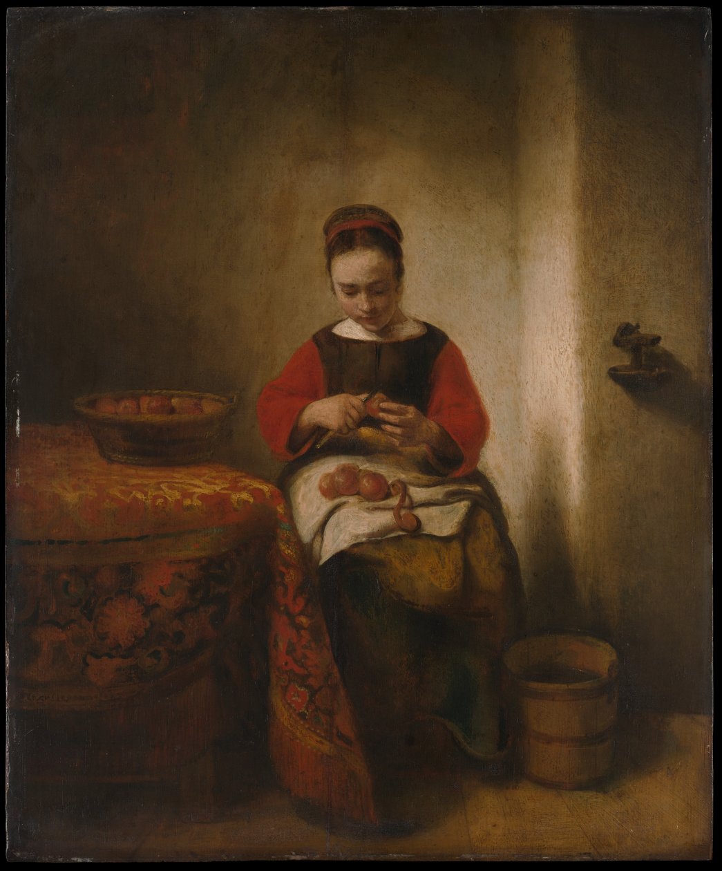 Młoda kobieta obierająca jabłka autorstwa Nicolaes Maes