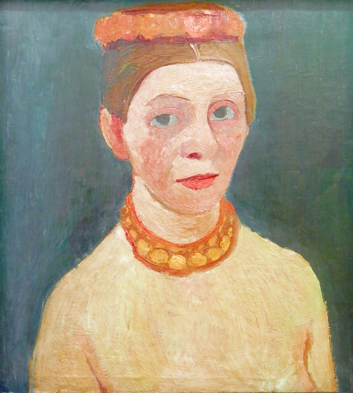 Autoportret z czerwonym wieńcem kwiatów i łańcuszkiem autorstwa Paula Modersohn Becker