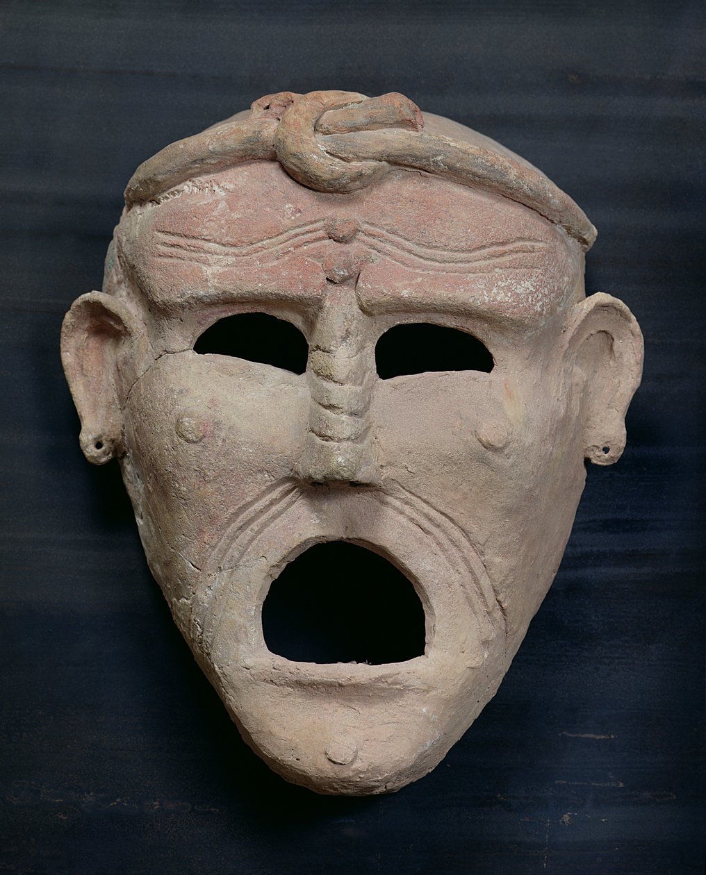 Punicka maska uroku, III-II w. p.n.e. (terakota) autorstwa Roman
