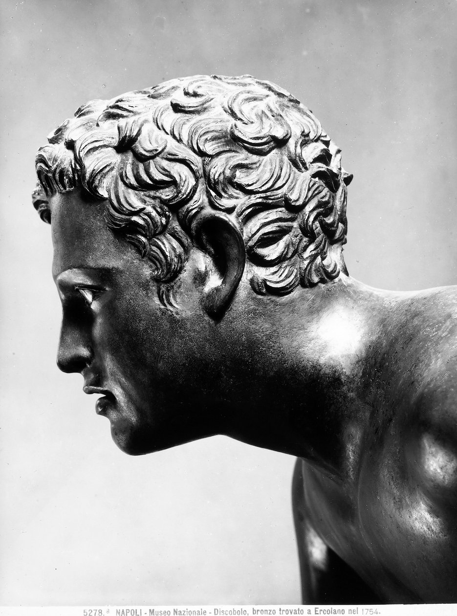 Pozłacana brązowa twarz Discobolus autorstwa Roman Roman