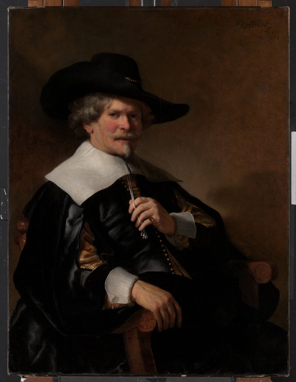 Portret mężczyzny siedzącego w fotelu autorstwa Unknown