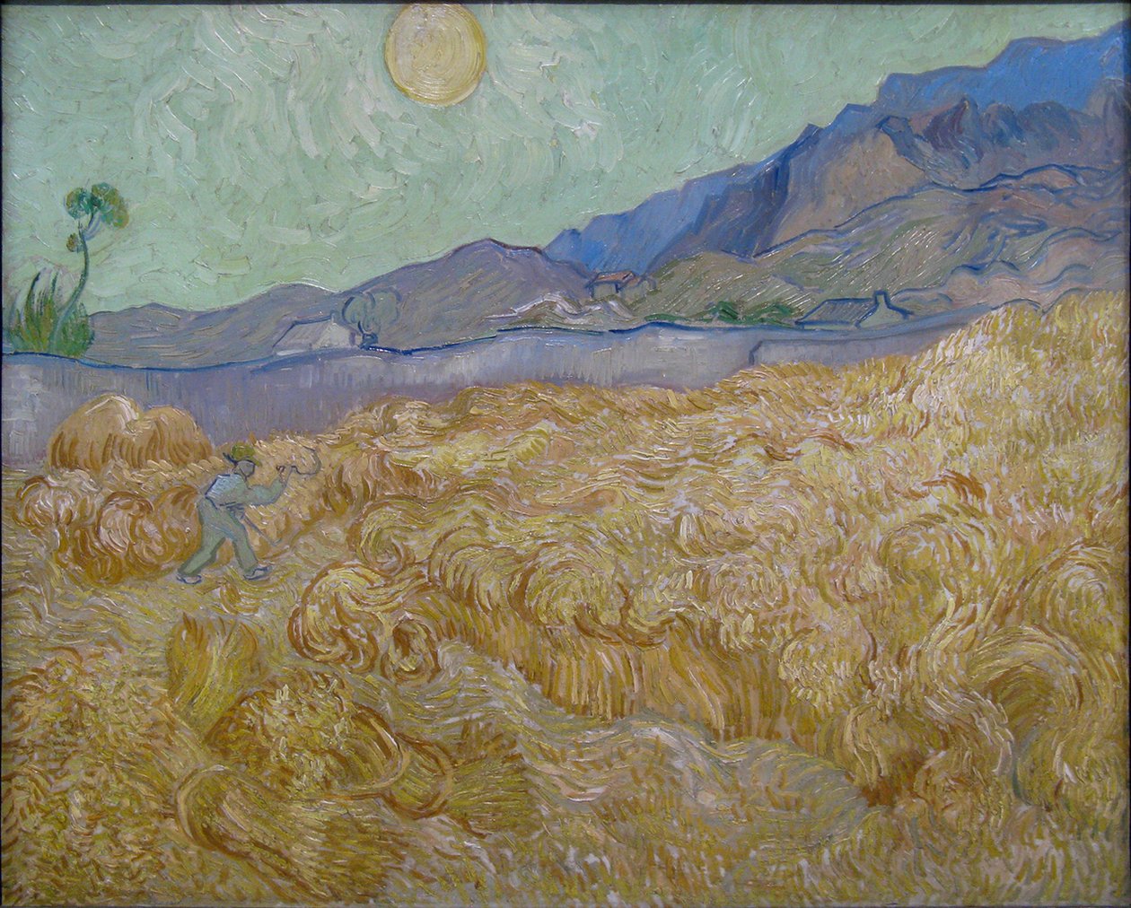 Pole kukurydzy z kosiarką autorstwa Vincent van Gogh